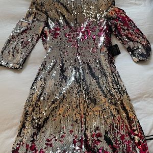 NWT Bebe long sleeved sequined dress